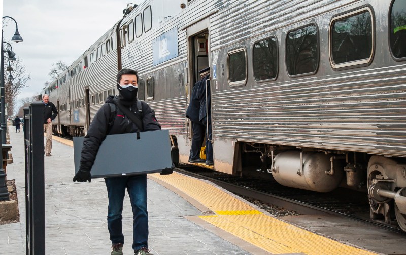 Metra commuters earlier this year during the pandemic. Photo: Charles Edward Miller