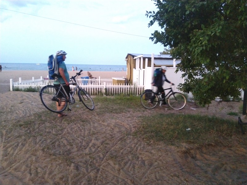 Cyclists detour around the fences at about 7:45 p.m. last night.