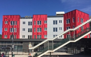 The Woodlawn Station affordable TOD, next to the Cottage Grove Green Line station.