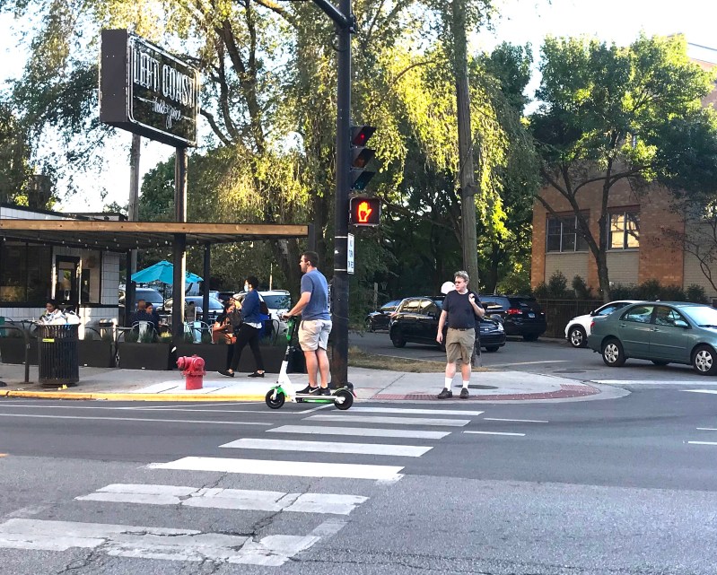 Riding a Lime scooter in Lakeview. Photo: John Greenfield