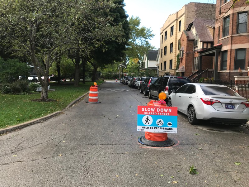 Traffic barrels placed on Henderson as part of the Slow Street route. Photo: John Greenfield