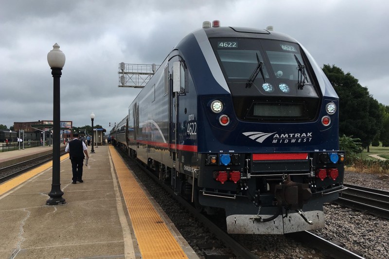 An Amtrak train in Galesburg, Illinois. Part of our state's Green New Deal plan should be better funding passenger rail to make it more competitive with driving. Photo via High Speed Rail Alliance