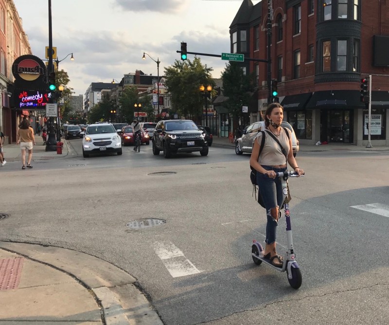 A scooter rider at Belmont/Broadway last September. Photo: John Greenfield