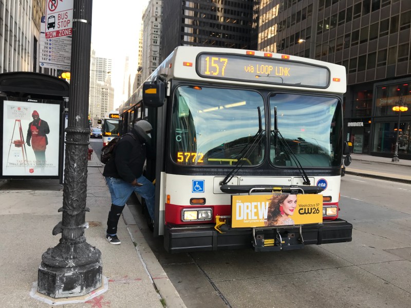 Boarding a #157 Streeterville/Taylor bus this month on Michigan Avenue. Photo: John Greenfield