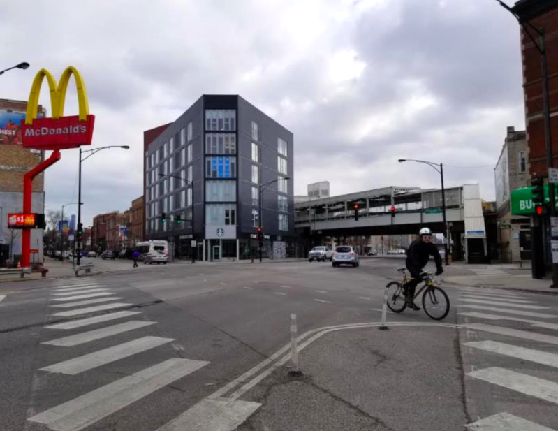 “The Western” TOD next to the Western Blue Line Station. The development pairs 44 residential units with only 10 parking spaces. Photo: Borna Khoshand