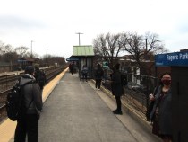 Commuters wait for a train at Metra's Rogers Park station. Photo: Igor Studenkov