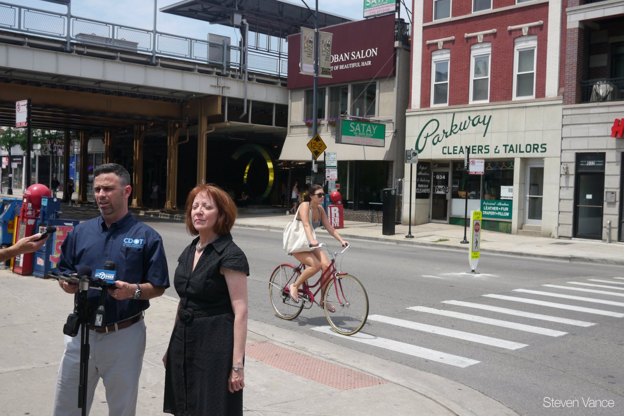 Alder Michele Smith at the installation of the first in-road "stop for pedestrians" sign on Armitage Avenue in 2013