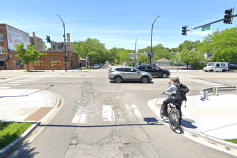 A westbound cyclist on Sunnyside Avenue waits to cross Western Avenue. A new westbound contraflow bike lane will legalize westbound riding on the one-way eastbound strech of Sunnyside east of Western. Image: Google Maps.