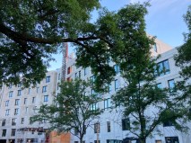 The Emmett St. all-affordable transit-oriented development rises next to the Logan Square Blue Line station. Photo: John Greenfield