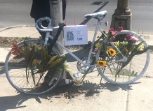 Ghost bike for Kevin Clark installed last Saturday at the Logan/Western crash site. Photo: Courtney Cobbs