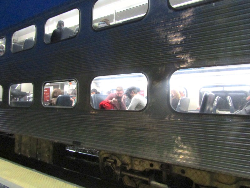 An outbound Union Pacific North line train leaves Rogers Park station. Photo: Igor Studenkov