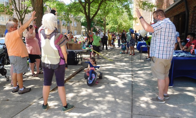 The crowd blesses bikes and scooters. Photo: Imelda March