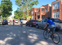 Young people bike on the Palmer Avenue Slow Street in Belmont Cragin in July 2020. Photo: John Greenfield