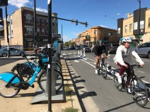 Divvy station and protected bike lanes on Milwaukee Avenue in Chicago's Logan Square neighborhood. Photo: John Greenfield