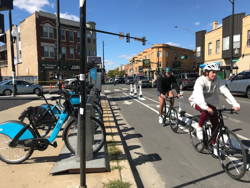 Divvy station and protected bike lanes on Milwaukee Avenue in Chicago's Logan Square neighborhood. Photo: John Greenfield