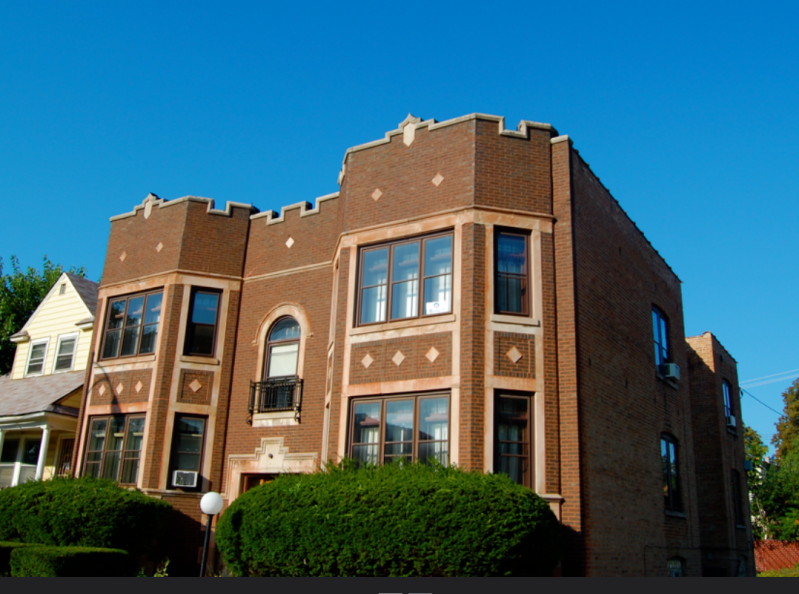 A four-flat in the Washington Heights community on Chicago's Far South Side. Modest zoning changes to allow small multiunit buildings near transit in areas that are currently zoned for single-family homes only could have a big impact on ridership. Photo: Eric Allix Rogers