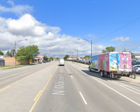 The 5300 block of North Milwaukee Avenue, looking north. The wide, five-lane layout of Milwaukee in this part of town encourages speeding. Image: Google Maps.