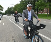 CDOT commissioner Gia Biagi and 24th Ward alderman Michael Scott ride electric Divvy bikes on Douglas Boulevard in North Lawndale during the ribbon-cutting event. Photo: CDOT