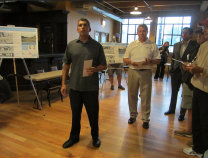 45th Ward aldermanic candidate John Garrido and Gladstone Park Chamber of Commerce president Dave Wians at a 2014 community meeting, holding stack of petitions against the Milwaukee protected bike lane proposal on the Far Northwest Side. Photo: John Greenfield