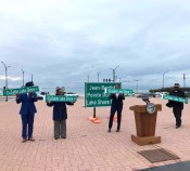 Moore, Lightfoot, King, and Martin pose with the new street signs. Photo: John Greenfield