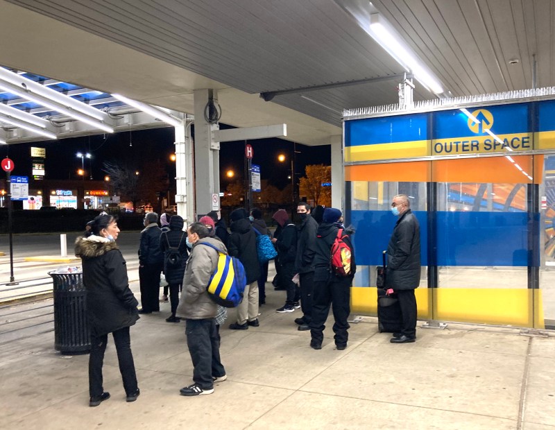 Waiting for a bus at the Jefferson Park Transit Center. Photo: John Greenfield