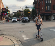A scooter rider in Chicago's Lakeview neighborhood. Photo: John Greenfield