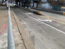 Looking south on Halsted below an Orange Line and Metra viaduct just south of the river. The existing bike lane has been scraped out to make room for a left turn lane for truckers. Photo: Matthew Maule