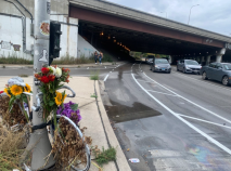 One of the new bike lanes on Logan Boulevard next to the ghost bike memorial for Kevin Clark. Photo: Sharon Hoyer