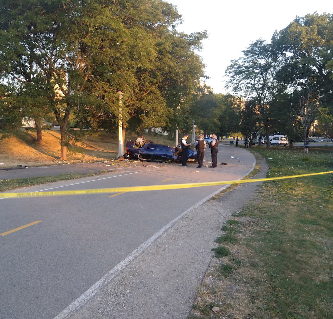In September 2020, a driver flipped their car onto the Lakefront Trail near Belmont Avenue, seriously injuring two of the occupants. Last Saturday there was a deadly car crash on the path in Edgewater. Photo provided by a reader.