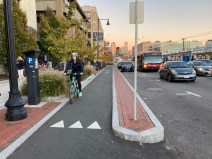 A raised bike lane on Commonwealth Avenue near Boston College. A facility like this can encourage "normal" people to bike. Photo: John Greenfield