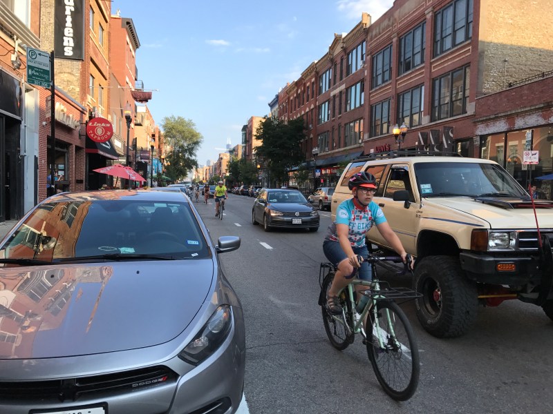 Cycling in the dashed bike lanes on the 1500 block of North Milwaukee Avenue. Photo: John Greenfield