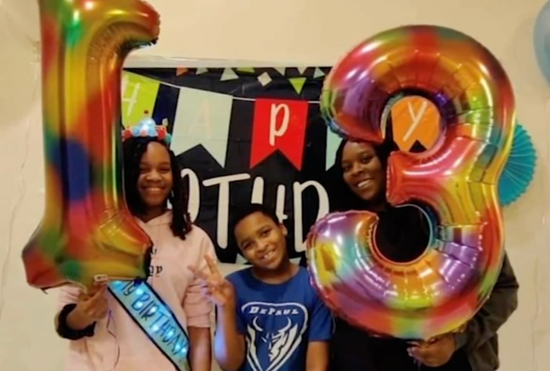 Angel Thomas with two of her children at her daughter's thirteenth birthday party a year ago. Photo: Theresa Dorsey