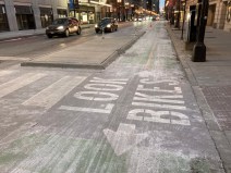 The Dearborn two-way protected bike lane covered in road salt last month. Photo: John Greenfield