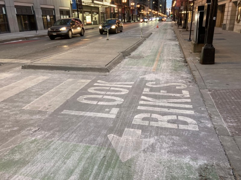 The Dearborn two-way protected bike lane covered in road salt last month. Photo: John Greenfield