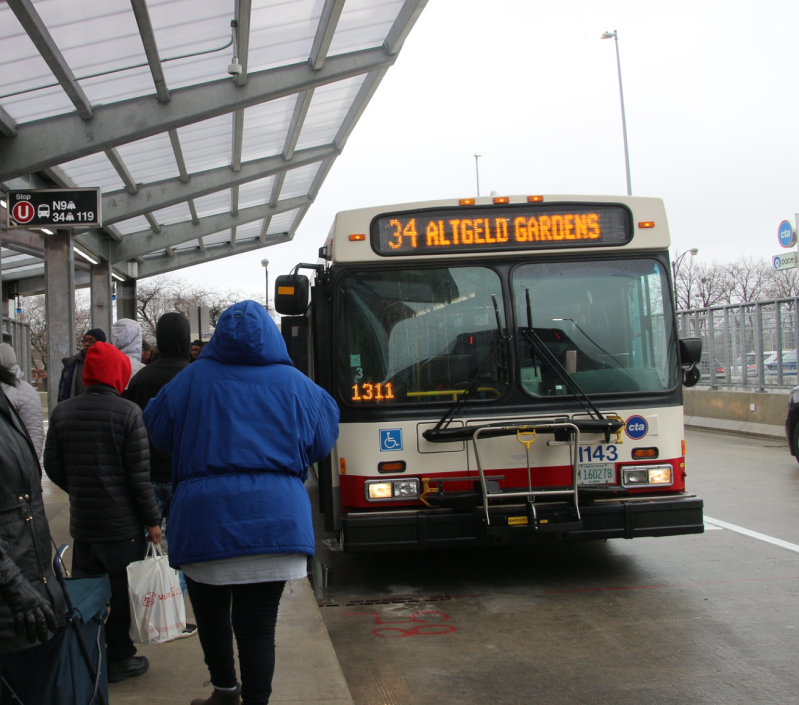 Catching a bus from the 95th/Dan Ryan Red Line station to the Altgeld Gardens housing project. Photo: Jeff Zoline