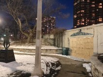 The boarded up entrance to the Buena Avenue underpass, next to the Chicago Peace Garden and the sculpture "Peace and Justice," a monument  to Daisaku Ikeda, founder of the Japanese Buddhist movement Soka Gakkai. Photo: John Greenfield