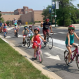 The concrete curb-protected bike lanes on Campbell Avenue in North Center are a relatively rare example of a Chicago bike route with sturdy  protection from drivers. Photo: Rebecca Resman