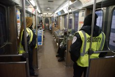Unarmed security guards on an 'L' car. Photo: CTA