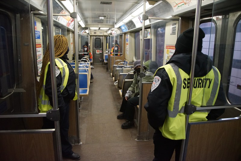 Unarmed security guards on an 'L' car. Photo: CTA