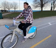A person riding one of Divvy's new e-bikes on the Lakefront Trail. Photo: John Greenfield