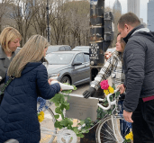 Gerardo Marciales' loved ones install a ghost bike at the intersection where he was killed. Image: John Greenfield