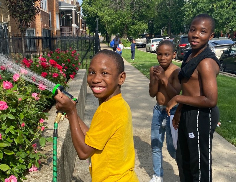Ja'lon James, left. According to a mentor, some of his "happiest moments were spent with his brothers tending the garden." Photo: GoFundMe