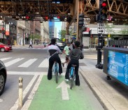 Riding non-electric bikes in the Loop. While blue bike rides are still free for members, all e-bike trips now carry a per-minute charge, and eventually they will be the only type of bike available. Photo: John Greenfield