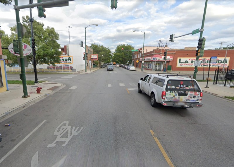 The 59th/St. Louis intersection, where the driver struck the bike rider, looking east. Image: Google Maps