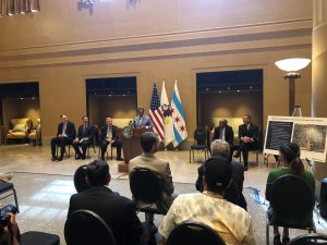 Mayor Lightfoot speaks at a lectern in Chicago Union Station