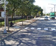A wheelchair user waits to cross 79th Street near Pulaski Road by Bogan High School. Currently speed cameras ticket drivers who speed by more than 6 mph at this location. Image: Google Maps
