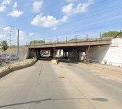 Looking north on Avenue L towards the viaducts where the van driver struck Rodriguez. This stretch is marked with "sharrows." Image: Google Maps