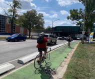 Concrete protection on the westbound bike lane on Logan Boulevard approaching Western Avenue, looking west. Photo: Sharon Hoyer