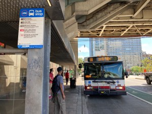 Catching a #18 16th/18th bus at the Roosevelt Road station earlier this month. Photo: John Greenfield
