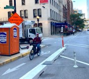 Kinzie is currently a mix of curb-protected and non-protected bike lanes. Photo: John Greenfield